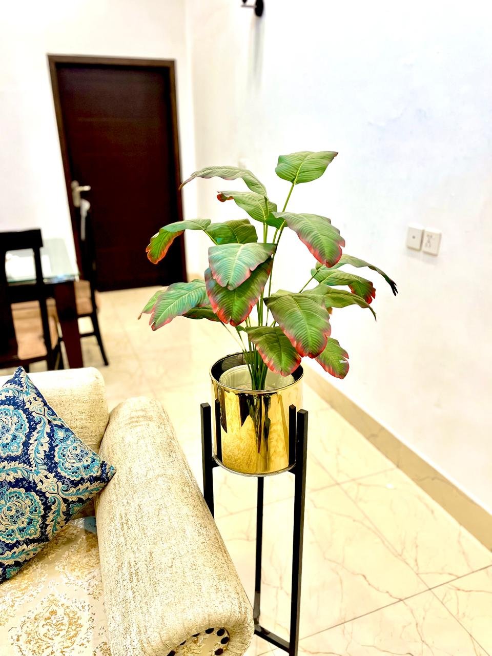 Artificial banana Plant with stand in a golden metal planter with stand