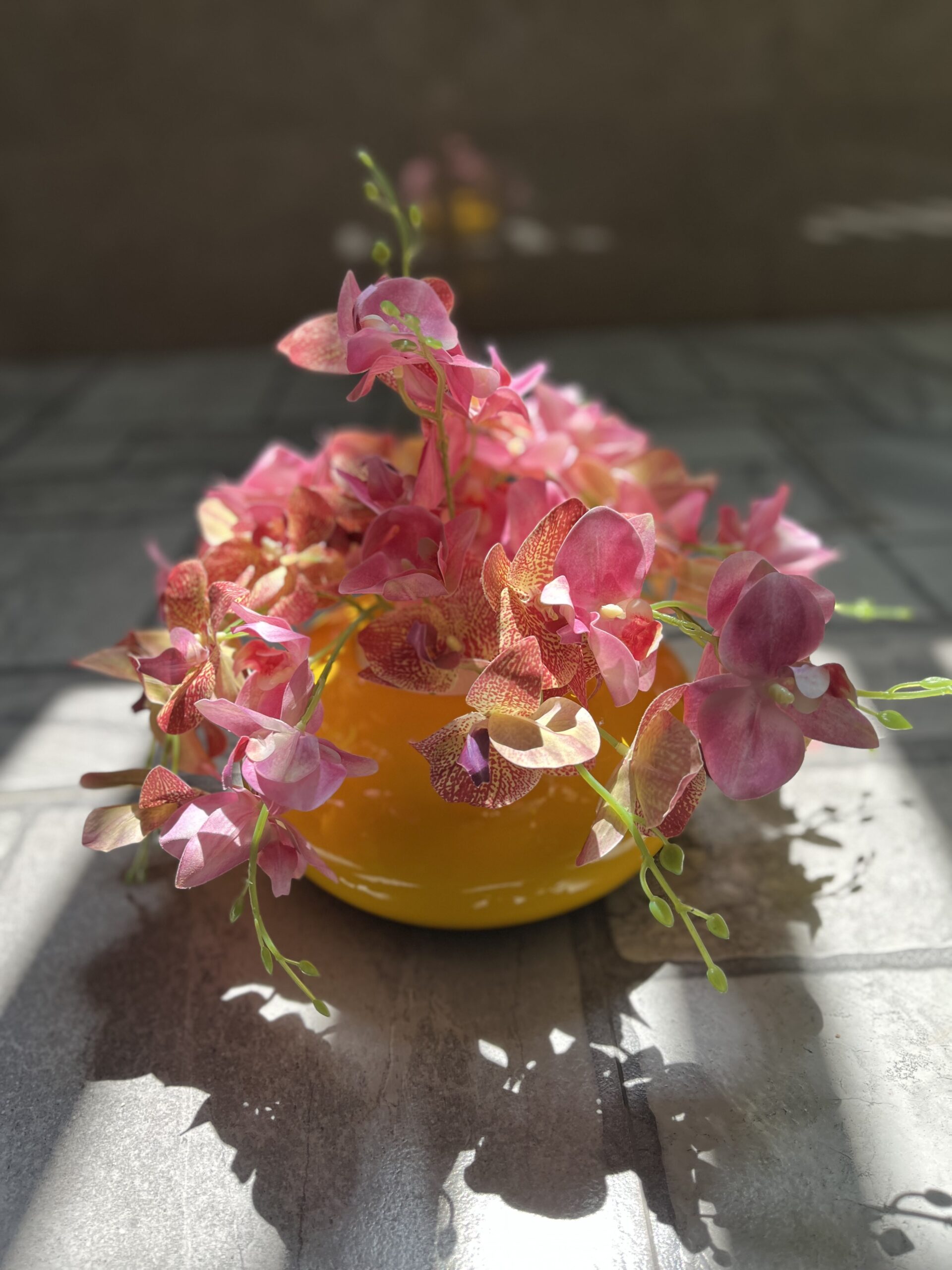 Pink Orchid Arrangement in Yellow Vase
