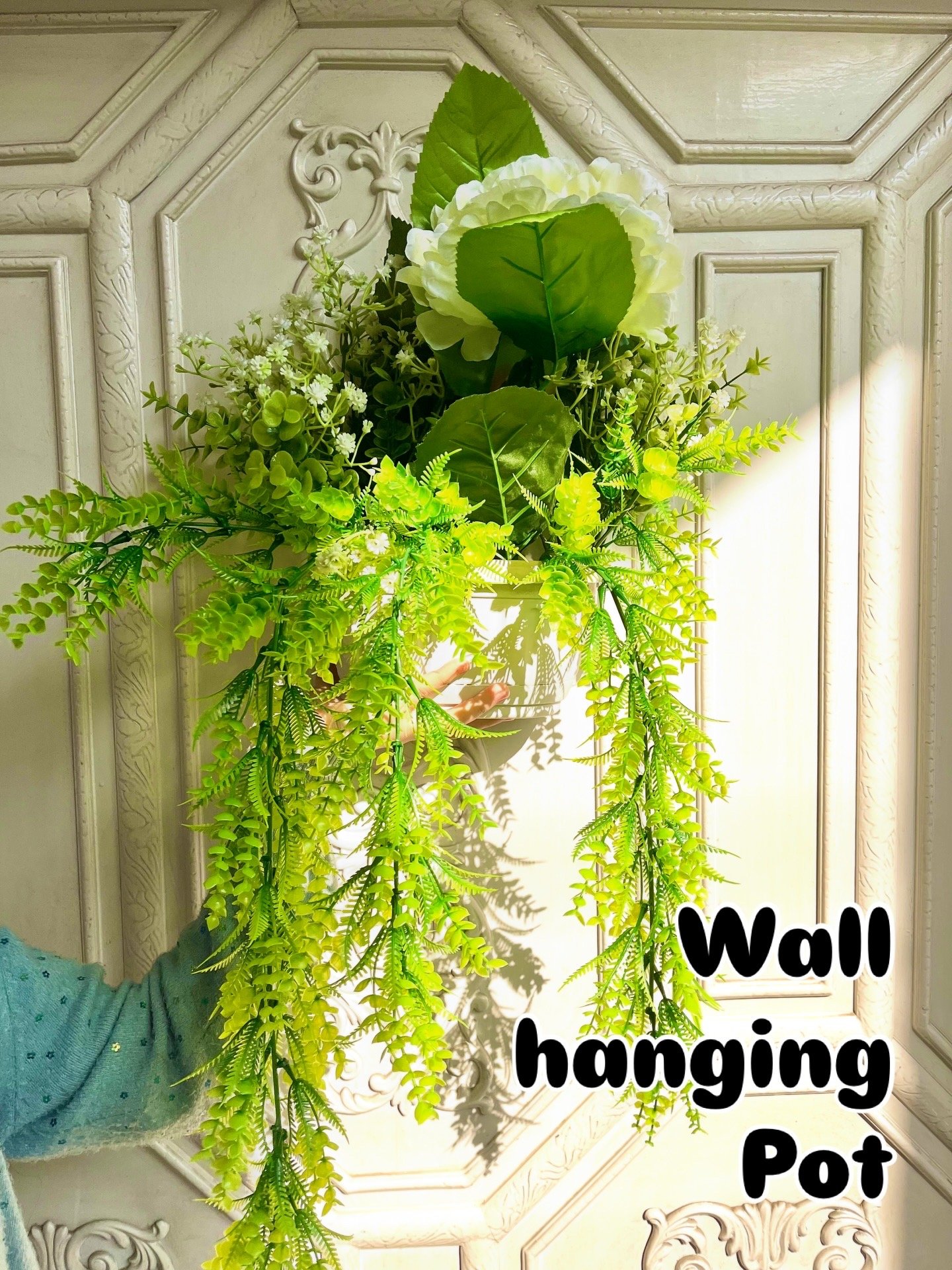 Wall hanging pot with vine and flower