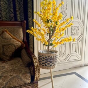 artificial yellow blossom tree with tripod jute basket
