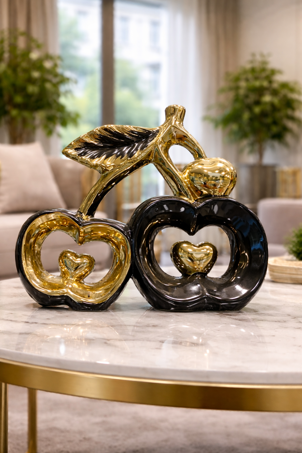 Elegant Gold and Black Apple Figurines with Heart Detail