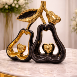Golden Heart Pear Sculptures on Marble