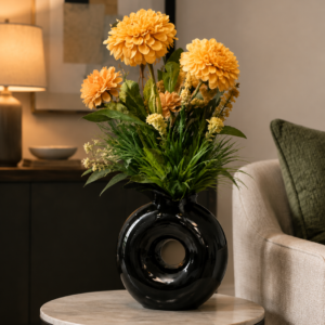 Circular Black Vase with Yellow Flowers