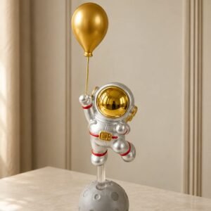 Floating Astronaut with Golden Balloon Figurine