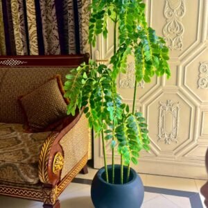 Artificial Green Leaf Plant in a Dark Pot