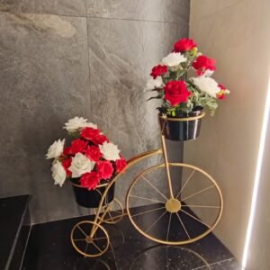 Decorative Gold Bicycle Planter with Red and White Roses